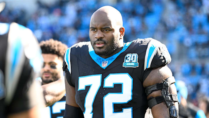 Dec 22, 2024; Charlotte, North Carolina, USA; Carolina Panthers offensive tackle Taylor Moton (72) on the sidelines before the game at Bank of America Stadium. Mandatory Credit: Bob Donnan-Imagn Images