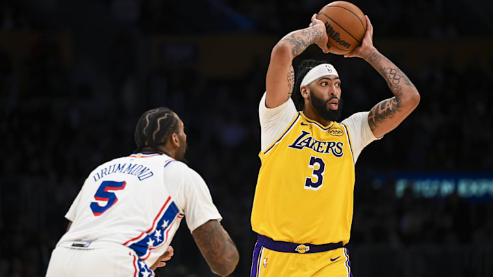 Nov 8, 2024; Los Angeles, California, USA; Los Angeles Lakers forward Anthony Davis (3) looks to pass against Philadelphia 76ers center Andre Drummond (5) during the second half at Crypto.com Arena. Mandatory Credit: Jonathan Hui-Imagn Images Nov 8, 2024; Los Angeles, California, USA; Los Angeles Lakers forward Anthony Davis (3) looks to pass against Philadelphia 76ers center Andre Drummond (5) during the second half at Crypto.com Arena. Mandatory Credit: Jonathan Hui-Imagn Images