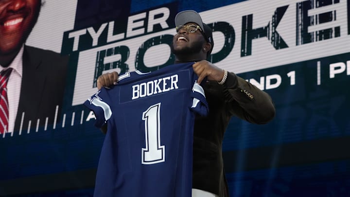 Apr 24, 2025; Green Bay, WI, USA; Alabama Crimson Tide offensive lineman Tyler Booker is selected by the Dallas Cowboys as the number twelve pick in the first round of the 2025 NFL Draft at Lambeau Field. Mandatory Credit: Kirby Lee-Imagn Images