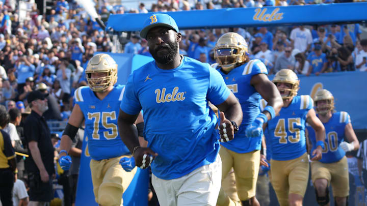 Sep 14, 2024; Pasadena, California, USA; UCLA Bruins head coach DeShaun Foster enters the field before the game against the Indiana Hoosiers at Rose Bowl. Mandatory Credit: Kirby Lee-Imagn Images Sep 14, 2024; Pasadena, California, USA; UCLA Bruins head coach DeShaun Foster enters the field before the game against the Indiana Hoosiers at Rose Bowl. Mandatory Credit: Kirby Lee-Imagn Images