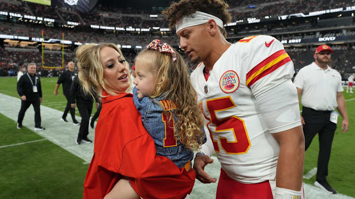 Kansas City Chiefs quarterback Patrick Mahomes (15) interacts with wife Brittany Mahomes and daughter Sterling Mahomes during the game against the Las Vegas Raiders.