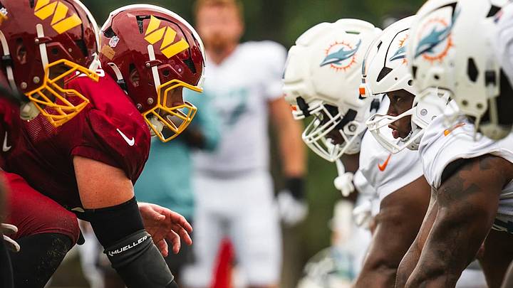 Washington Commanders and Miami Dolphins linemen face off during a joint training camp practice ahead of their preseason matchup. Washington Commanders and Miami Dolphins linemen face off during a joint training camp practice ahead of their preseason matchup.