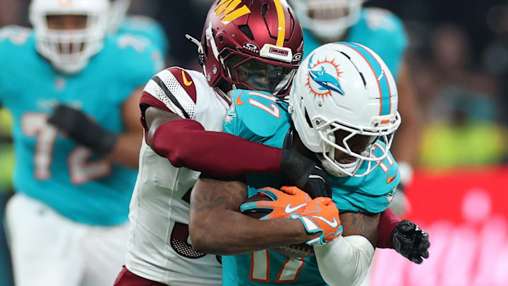Miami Dolphins WR Jaylen Waddle, Washington Commanders DB Jeremy Reaves Miami Dolphins WR Jaylen Waddle, Washington Commanders DB Jeremy Reaves