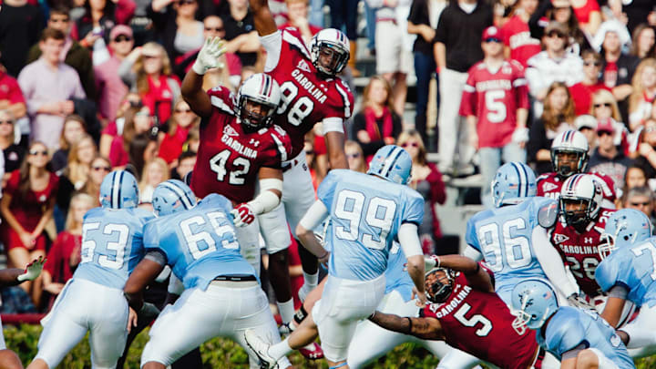 Nov 19, 2011; Columbia, SC, USA; South Carolina Gamecocks defensive tackle Travian Robertson (42) and defensive end Devin Taylor (98) and cornerback Stephon Gilmore (5) attempt to block the field goal attempt of Citadel Bulldogs kicker Ryan Sellers (99) in the first half at Williams-Brice Stadium. Mandatory Credit: Jeff Blake-Imagn Images Nov 19, 2011; Columbia, SC, USA; South Carolina Gamecocks defensive tackle Travian Robertson (42) and defensive end Devin Taylor (98) and cornerback Stephon Gilmore (5) attempt to block the field goal attempt of Citadel Bulldogs kicker Ryan Sellers (99) in the first half at Williams-Brice Stadium. Mandatory Credit: Jeff Blake-Imagn Images