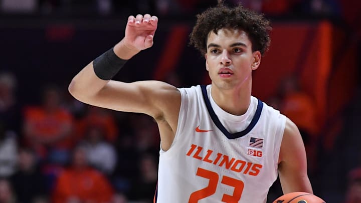 Feb 10, 2026; Champaign, Illinois, USA;  Illinois Fighting Illini guard Keaton Wagler (23) directs the offense during the first half against the Wisconsin Badgers at State Farm Center.