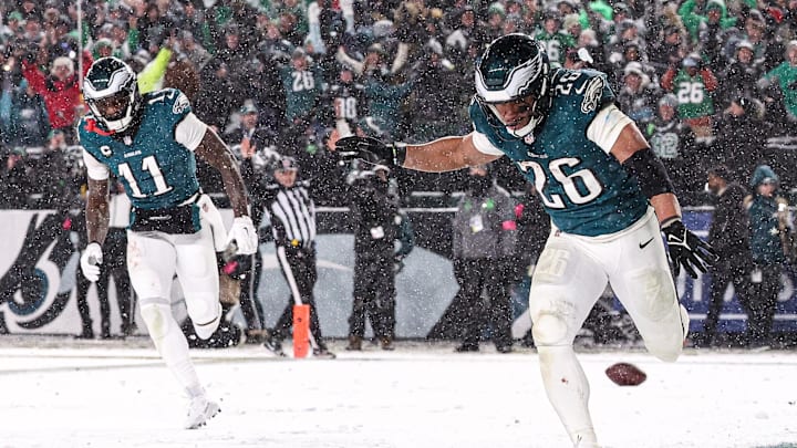 Jan 19, 2025; Philadelphia, Pennsylvania, USA; Philadelphia Eagles running back Saquon Barkley (26) celebrates alongside wide receiver A.J. Brown (11) after his touchdown run during the fourth quarter against the Los Angeles Rams in a 2025 NFC divisional round game at Lincoln Financial Field. Mandatory Credit: Bill Streicher-Imagn Images Jan 19, 2025; Philadelphia, Pennsylvania, USA; Philadelphia Eagles running back Saquon Barkley (26) celebrates alongside wide receiver A.J. Brown (11) after his touchdown run during the fourth quarter against the Los Angeles Rams in a 2025 NFC divisional round game at Lincoln Financial Field. Mandatory Credit: Bill Streicher-Imagn Images