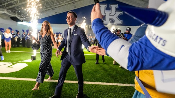 New Kentucky Wildcat head coach Will Stein arrives with wife, Darby has he is introduced at Kentucky on Wednesday, December 3, 2025 New Kentucky Wildcat head coach Will Stein arrives with wife, Darby has he is introduced at Kentucky on Wednesday, December 3, 2025