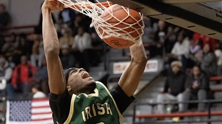 St.Vincent-St. Mary’s Elijah Chapman dunks during their game against McKinley on Tuesday, Dec. 2, 2025. Bob Rossiter / Special To The Canton Repository