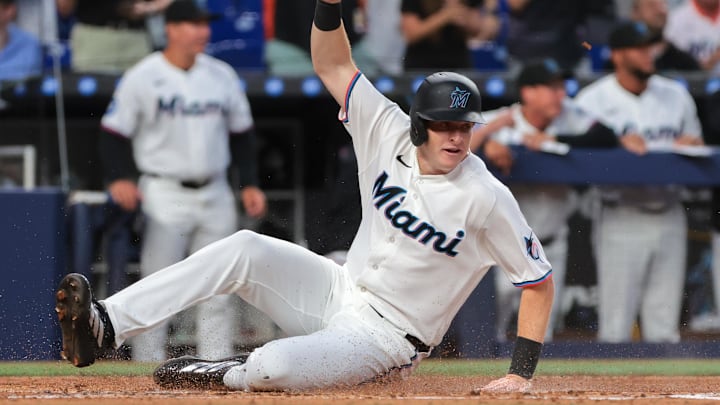 Miami Marlins designated hitter Owen Caissie (17) scores against the Colorado Rockies during the second inning at loanDepot Park