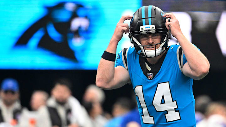 Oct 26, 2025; Charlotte, North Carolina, USA;  Carolina Panthers quarterback Andy Dalton (14) calls a play in the fourth quarter against the Buffalo Bills at Bank of America Stadium. Mandatory Credit: Bob Donnan-Imagn Images