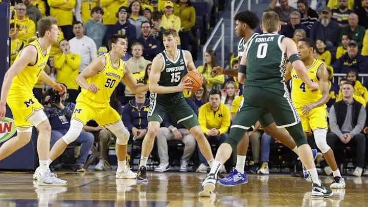 Michigan State Spartans center Carson Cooper (15) handles the ball Michigan State Spartans center Carson Cooper (15) handles the ball
