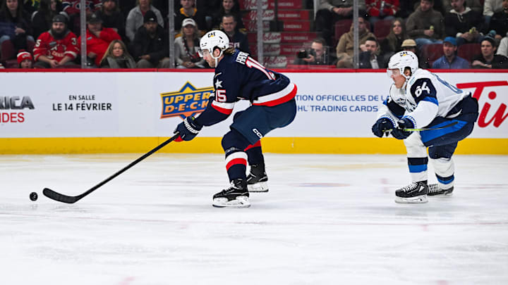 Feb 13, 2025; Montreal, Quebec, CAN; [Imagn Images direct customers only] Team USA defenseman Noah Hanifin (15) plays the puck against Team Finland in the second period during a 4 Nations Face-Off ice hockey game at Bell Centre. Mandatory Credit: David Kirouac-Imagn Images