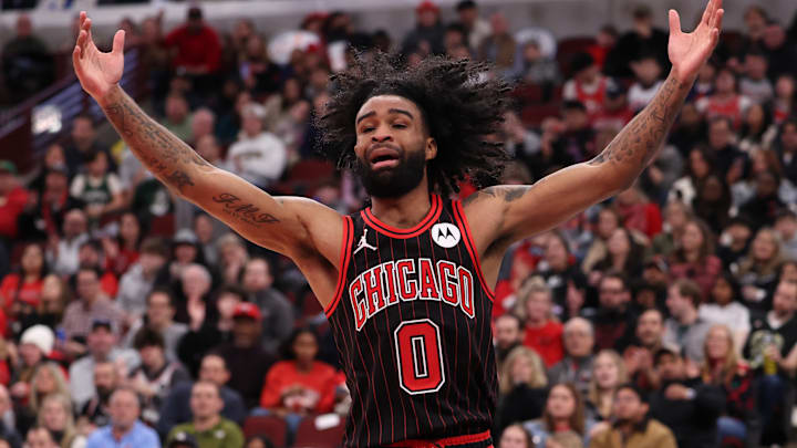 Chicago Bulls guard Coby White reacts to a play during a game against the Milwaukee Bucks.