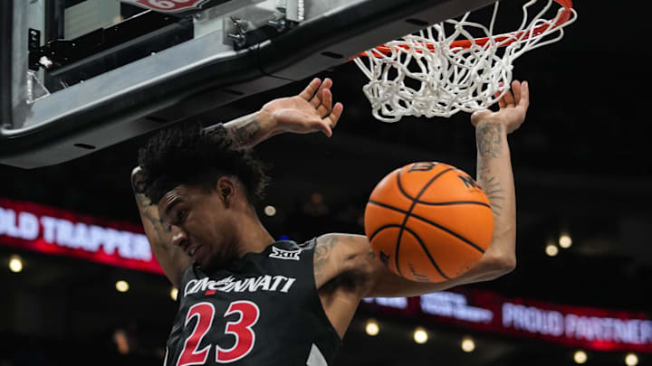 Bearcats Dillon Mitchell (23) scores during Game 2 of the 2025 Phillips 66 Big 12 Basketball Championship against the Iowa State Cyclones at the T-Mobile Center in Kansas City, Missouri on Wednesday March 12, 2025. Cyclones won the game with a final score of 76-56.