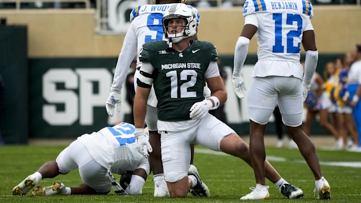 Oct 11, 2025; East Lansing, Michigan, USA; Michigan State tight end Jack Velling (12) reacts after dropping a pass against the UCLA Bruins in the fourth quarter at Spartan Stadium. Mandatory Credit: Brendan Mullin-Imagn Images Oct 11, 2025; East Lansing, Michigan, USA; Michigan State tight end Jack Velling (12) reacts after dropping a pass against the UCLA Bruins in the fourth quarter at Spartan Stadium. Mandatory Credit: Brendan Mullin-Imagn Images