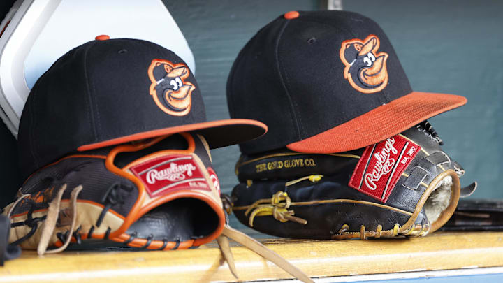 Apr 27, 2023; Detroit, Michigan, USA;  Baltimore Orioles hats and glove sits in dugout in the second inning against the Detroit Tigers at Comerica Park.