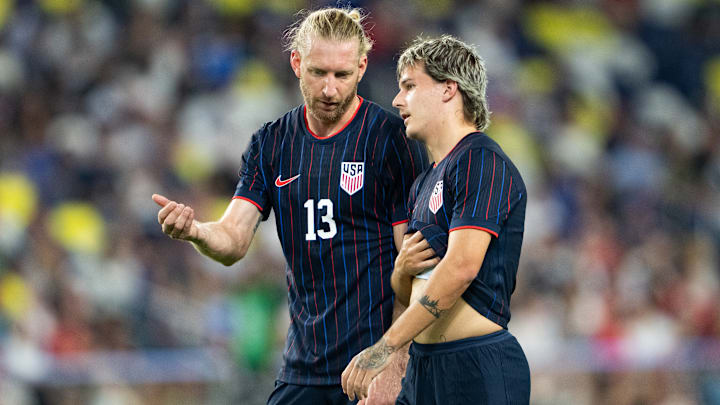 Tim Ream and John Tolkin talk during the USMNT's 4-0 loss to Switzerland.