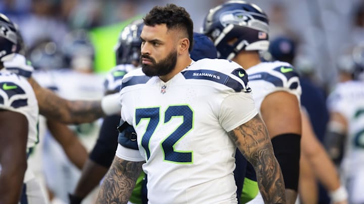 Dec 8, 2024; Glendale, Arizona, USA; Seattle Seahawks offensive tackle Abraham Lucas (72) against the Arizona Cardinals at State Farm Stadium. Mandatory Credit: Mark J. Rebilas-Imagn Images
