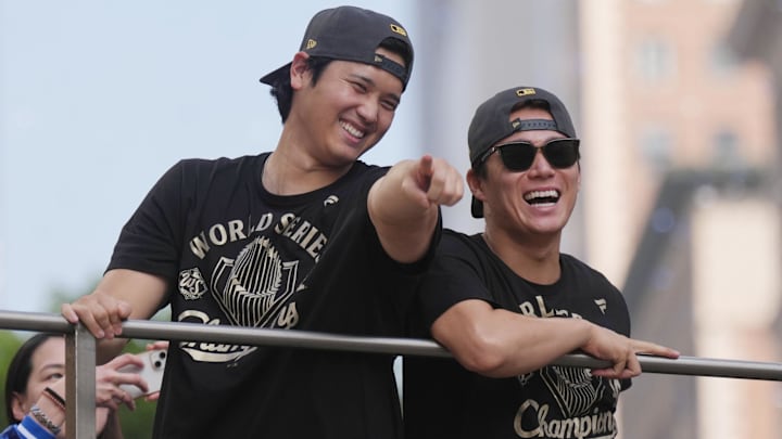 Nov 3, 2025; Los Angeles, CA, USA;  Los Angeles Dodgers two-way player Shohei Ohtani (17) and pitcher Yoshinobu Yamamoto (18) during the World Series championship parade and celebration. Mandatory Credit: Kirby Lee-Imagn Images Nov 3, 2025; Los Angeles, CA, USA;  Los Angeles Dodgers two-way player Shohei Ohtani (17) and pitcher Yoshinobu Yamamoto (18) during the World Series championship parade and celebration. Mandatory Credit: Kirby Lee-Imagn Images