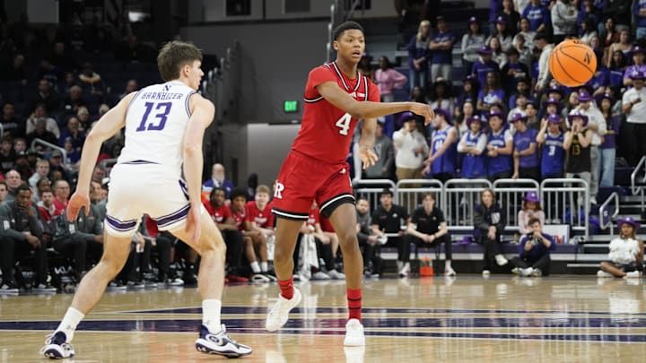 Jan 29, 2025; Evanston, Illinois, USA; Northwestern Wildcats guard Brooks Barnhizer (13) defends Rutgers Scarlet Knights forward Ace Bailey (4) during the first half at Welsh-Ryan Arena. Mandatory Credit: David Banks-Imagn Images