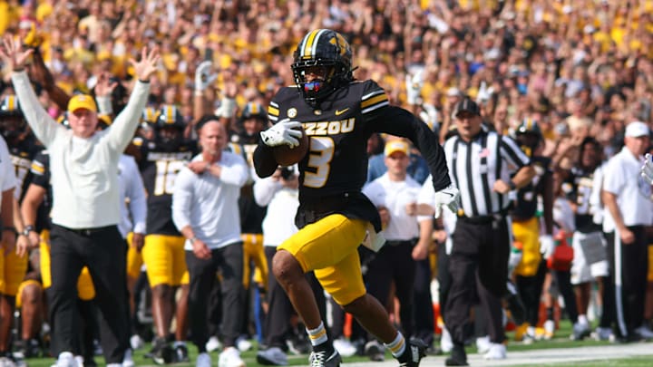 Sep 6, 2025; Columbia, Missouri, USA; Missouri Tigers wide receiver Kevin Coleman Jr. runs the ball short of the end zone against Kansas.