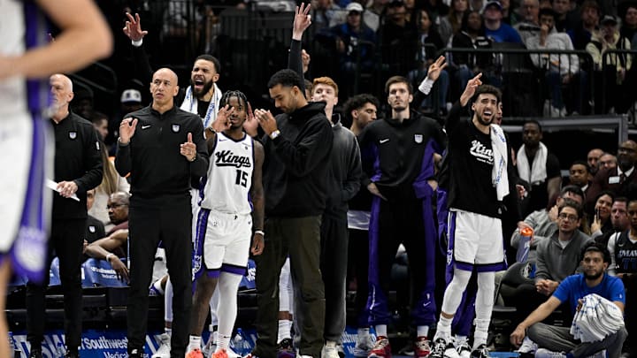Nov 19, 2023; Dallas, Texas, USA; The Sacramento Kings bench celebrates after guard Malik Monk (not pictured) makes a three point basket against the Dallas Mavericks during the second half at the American Airlines Center. Mandatory Credit: Jerome Miron-Imagn Images Nov 19, 2023; Dallas, Texas, USA; The Sacramento Kings bench celebrates after guard Malik Monk (not pictured) makes a three point basket against the Dallas Mavericks during the second half at the American Airlines Center. Mandatory Credit: Jerome Miron-Imagn Images