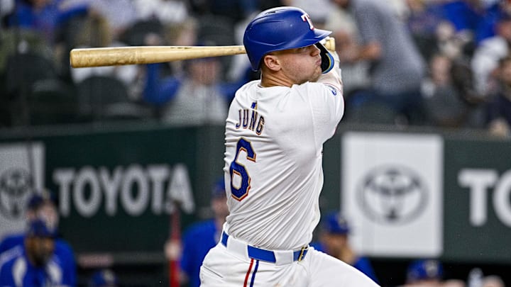 Mar 31, 2024; Arlington, Texas, USA; Texas Rangers third baseman Josh Jung (6) at bat during the game between the Texas Rangers and the Chicago Cubs at Globe Life Field. Mandatory Credit: Jerome Miron-USA TODAY Sports