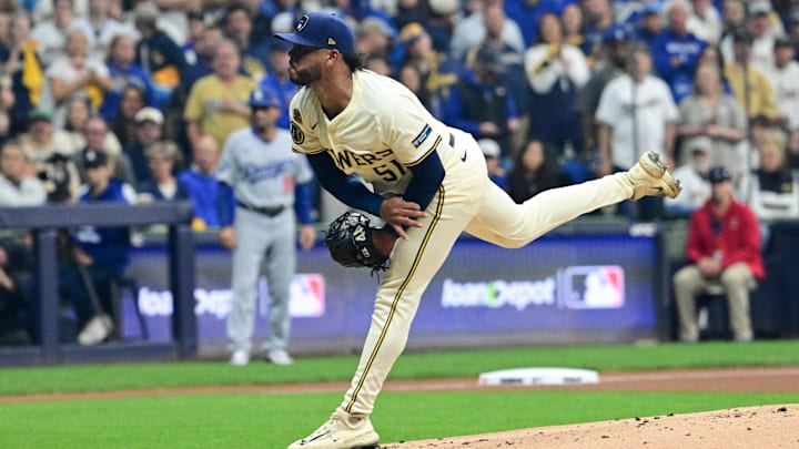 Oct 14, 2025; Milwaukee, Wisconsin, USA; Milwaukee Brewers pitcher Freddy Peralta (51) throws a pitch against the Los Angeles Dodgers in the first inning during game two of the NLCS round for the 2025 MLB playoffs at American Family Field. Mandatory Credit: Benny Sieu-Imagn Images