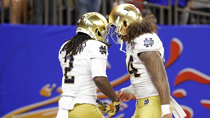 Jan 2, 2025; New Orleans, LA, USA; Notre Dame Fighting Irish wide receiver Jayden Harrison (2) celebrates after scoring a touchdown during the second half against Georgia Bulldogs at Caesars Superdome. Mandatory Credit: Amber Searls-Imagn Images Jan 2, 2025; New Orleans, LA, USA; Notre Dame Fighting Irish wide receiver Jayden Harrison (2) celebrates after scoring a touchdown during the second half against Georgia Bulldogs at Caesars Superdome. Mandatory Credit: Amber Searls-Imagn Images