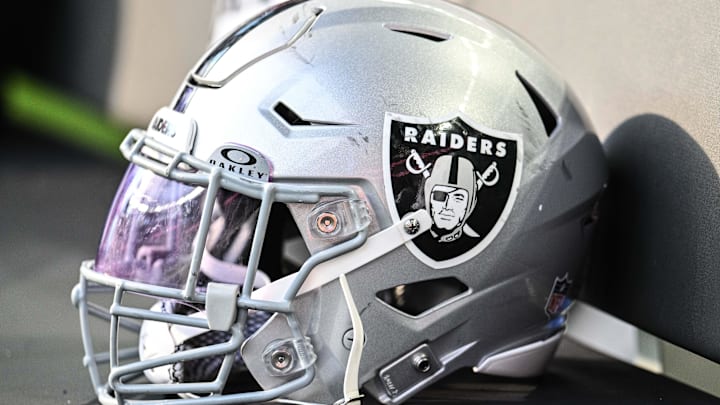 Aug 10, 2024; Minneapolis, Minnesota, USA; A Las Vegas Raiders helmet sits on the team bench before the game against the Minnesota Vikings at U.S. Bank Stadium. Mandatory Credit: Jeffrey Becker-Imagn Images