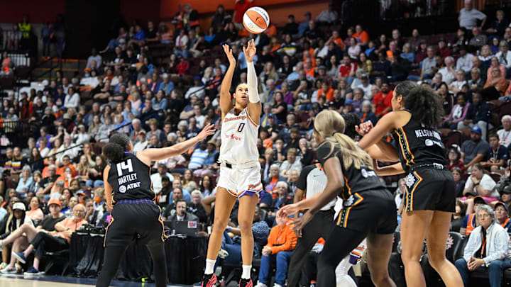 Jun 18, 2025; Uncasville, Connecticut, USA; Phoenix Mercury forward Satou Sabally (0) shoots the ball against against the Connecticut Sun during the second half at Mohegan Sun Arena. Mandatory Credit: Eric Canha-Imagn Images