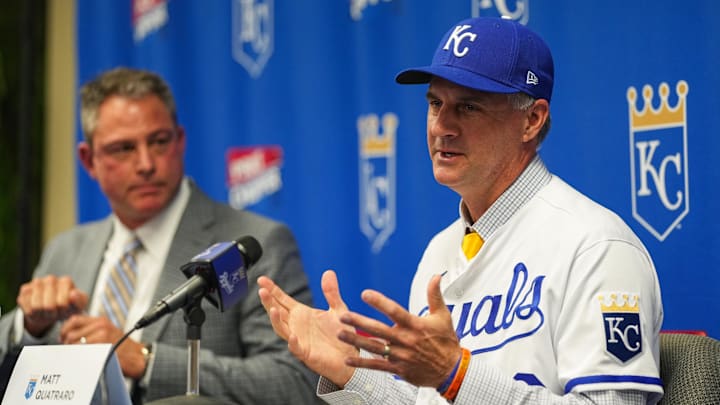 Nov 3, 2022; Kansas City, Missouri, USA; Kansas City Royals manager Matt Quatraro (33) and general manager J.J. Picollo talk with media during a press conference at Kauffman Stadium. Mandatory Credit: Jay Biggerstaff-Imagn Images
