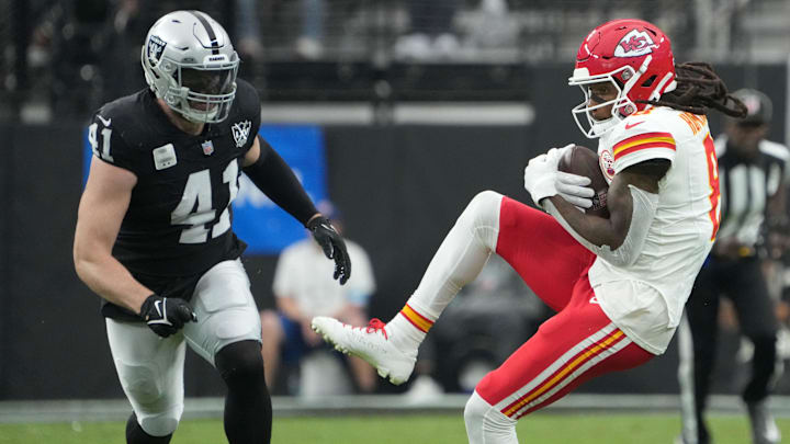 Oct 27, 2024; Paradise, Nevada, USA; Kansas City Chiefs wide receiver DeAndre Hopkins (8) catches the ball against Las Vegas Raiders linebacker Robert Spillane (41) in the first half at Allegiant Stadium. Mandatory Credit: Kirby Lee-Imagn Images
