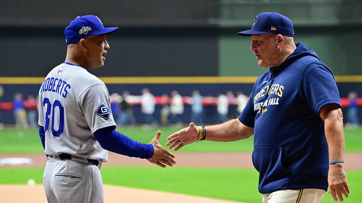 Oct 13, 2025; Milwaukee, Wisconsin, USA; Los Angeles Dodgers manager Dave Roberts (30) greets Milwaukee Brewers manager Pat Murphy (49) prior to game one of the NLCS round for the 2025 MLB playoffs at American Family Field. Mandatory Credit: Benny Sieu-Imagn Images Oct 13, 2025; Milwaukee, Wisconsin, USA; Los Angeles Dodgers manager Dave Roberts (30) greets Milwaukee Brewers manager Pat Murphy (49) prior to game one of the NLCS round for the 2025 MLB playoffs at American Family Field. Mandatory Credit: Benny Sieu-Imagn Images