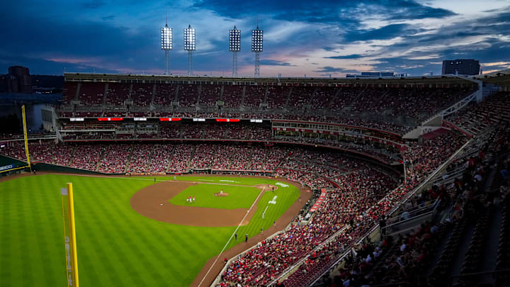 The sun sets during the sixth inning of the MLB interleague game between the Cincinnati Reds and the Minnesota Twins at Great American Ball Park in downtown Cincinnati on Tuesday, June 17, 2025. The Reds won 6-5.