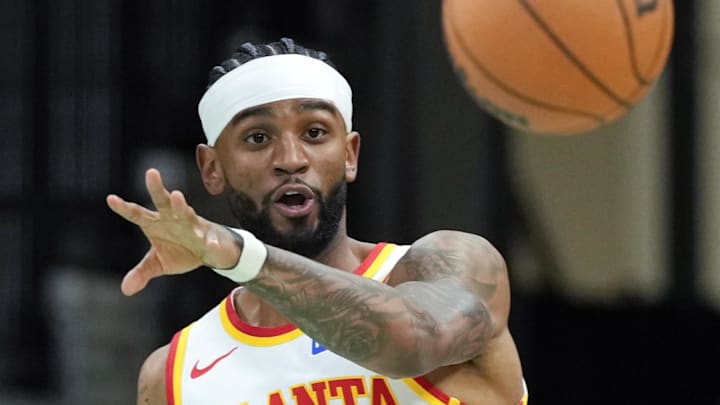 Nov 20, 2025; San Antonio, Texas, USA; Atlanta Hawks Nickeil Alexander-Walker (7) passes the ball during the first half against the San Antonio Spurs at Frost Bank Center. Mandatory Credit: Scott Wachter-Imagn Images