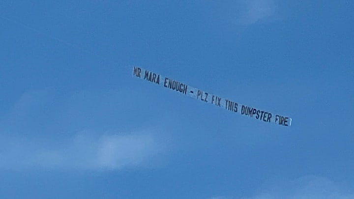 A banner being flown from an airplane above MetLife Stadium imploring New York Giants team ownership to fix the team.