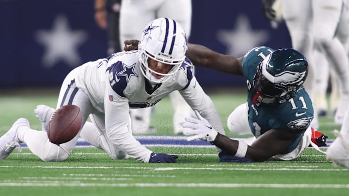 Dec 10, 2023; Arlington, Texas, USA; Philadelphia Eagles wide receiver A.J. Brown (11) fumbles the