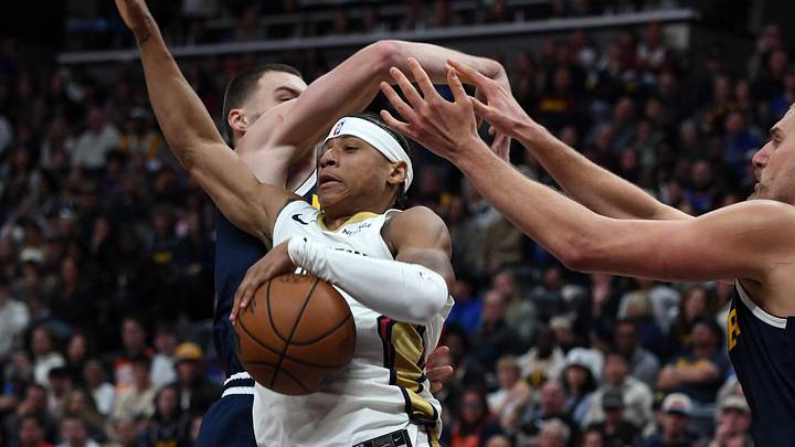 Oct 24, 2026; Denver, Colorado, USA; New Orleans Pelicans guard Jeremiah Fears (0) has the ball tied up by Denver Nuggets center Nikola Jokic (15) during the second half at Ball Arena. Mandatory Credit: Christopher Hanewinckel-Imagn Images Oct 24, 2026; Denver, Colorado, USA; New Orleans Pelicans guard Jeremiah Fears (0) has the ball tied up by Denver Nuggets center Nikola Jokic (15) during the second half at Ball Arena. Mandatory Credit: Christopher Hanewinckel-Imagn Images