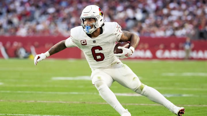 Dec 15, 2024; Glendale, Arizona, USA; Arizona Cardinals running back James Conner (6) against the New England Patriots at State Farm Stadium. Mandatory Credit: Mark J. Rebilas-Imagn Images Dec 15, 2024; Glendale, Arizona, USA; Arizona Cardinals running back James Conner (6) against the New England Patriots at State Farm Stadium. Mandatory Credit: Mark J. Rebilas-Imagn Images