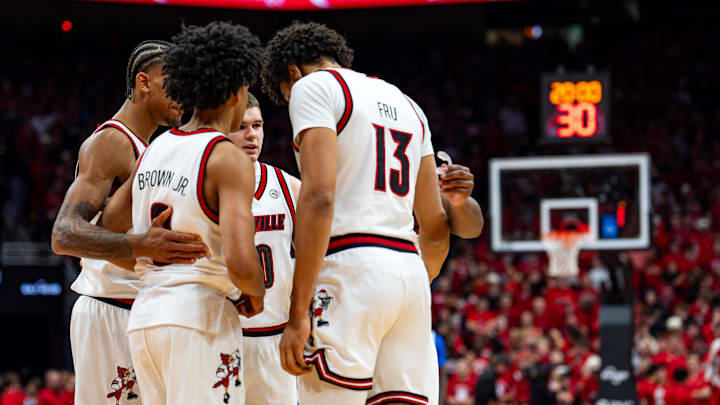 Louisville players huddled before tipoff as the Cardinals hosted the Kentucky Wildcats at the KFC Yum! Center on Tuesday, Nov. 11, 2025.