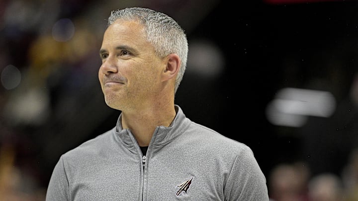 Mar 9, 2024; Tallahassee, Florida, USA; Florida State Seminoles head football coach Mike Norvell accepts the Bear Bryant coach of the Year award during a media timeout of a basketball game against the Miami Hurricanes at Donald L. Tucker Center. Mandatory Credit: Melina Myers-Imagn Images