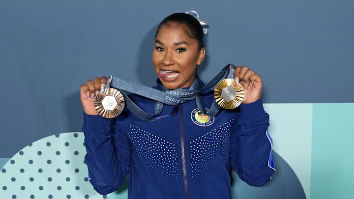 Aug 5, 2024; Paris, France; Jordan Chiles of the United States poses for a photo with her gold and bronze medasl after day three of the gymnastics event finals during the Paris 2024 Olympic Summer Games.