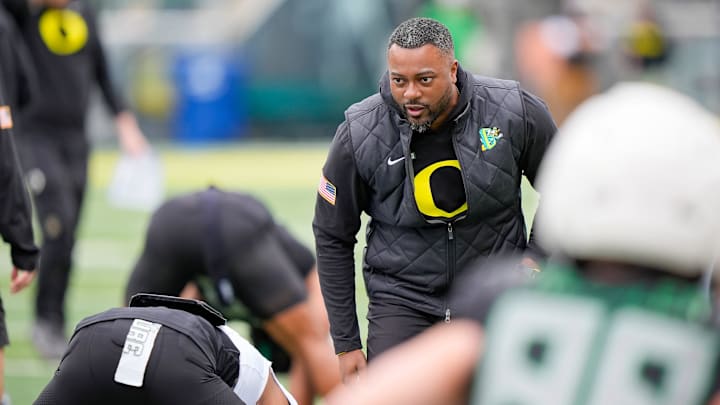 Oregon wide receivers coach Ross Douglas works with players during Oregon’s spring game on April 26, 2025, at Autzen Stadium in Eugene.