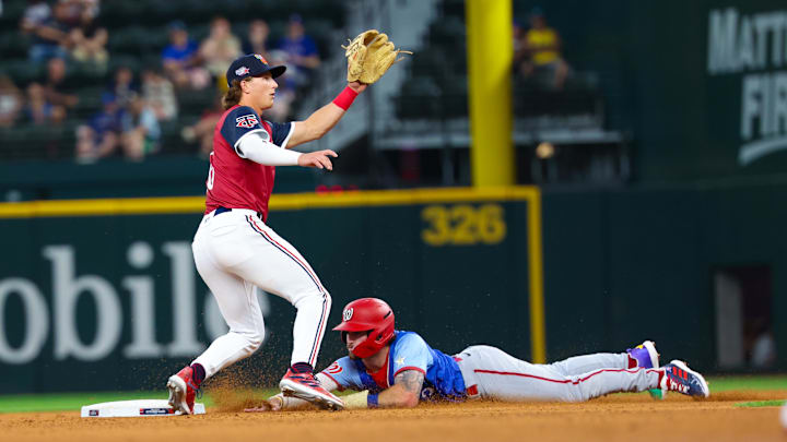 Jul 13, 2024; Arlington, TX, USA; National League Future outfielder Dylan Crews (3) steals second base ahead of the tag by American League Future infielder Luke Keaschall (16) during the fifth inning during the Major league All-Star Futures game at Globe Life Field. Jul 13, 2024; Arlington, TX, USA; National League Future outfielder Dylan Crews (3) steals second base ahead of the tag by American League Future infielder Luke Keaschall (16) during the fifth inning during the Major league All-Star Futures game at Globe Life Field.