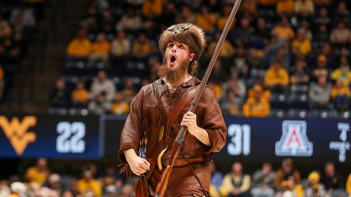 Jan 7, 2025; Morgantown, West Virginia, USA; The West Virginia Mountaineers mascot performs during the first half against the Arizona Wildcats at WVU Coliseum. Mandatory Credit: Ben Queen-Imagn Images Jan 7, 2025; Morgantown, West Virginia, USA; The West Virginia Mountaineers mascot performs during the first half against the Arizona Wildcats at WVU Coliseum. Mandatory Credit: Ben Queen-Imagn Images