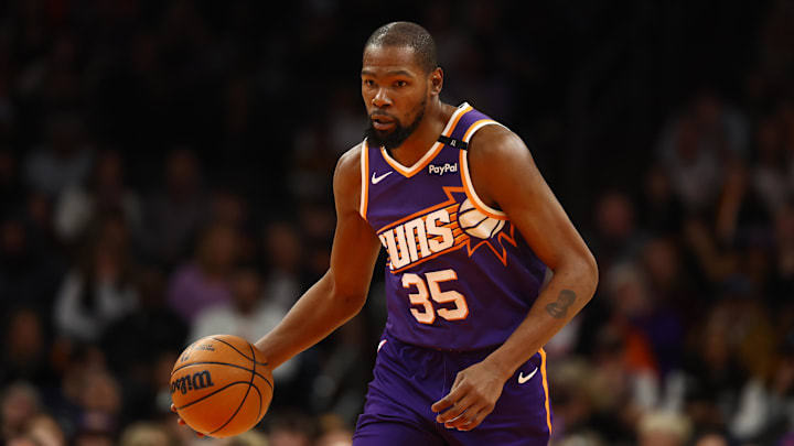 Dec 27, 2024; Phoenix, Arizona, USA; Phoenix Suns forward Kevin Durant (35) against the Dallas Mavericks at Footprint Center. Mandatory Credit: Mark J. Rebilas-Imagn Images