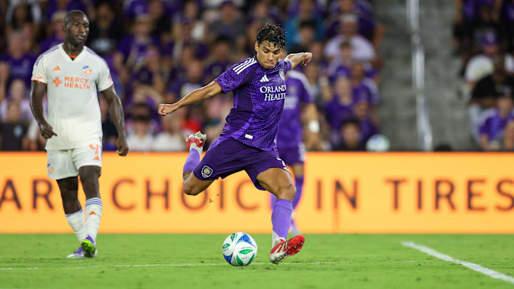 Jun 28, 2025; Orlando, Florida, USA; Orlando City forward Ramiro Enrique (7) shoots the ball against FC Cincinnati in the second half at Inter&Co Stadium. Mandatory Credit: Nathan Ray Seebeck-Imagn Images