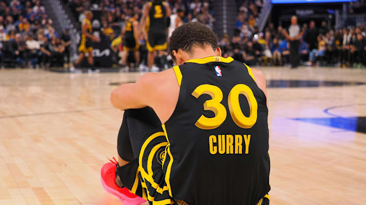 Nov 12, 2023; San Francisco, California, USA; Golden State Warriors guard Stephen Curry (30) sits on