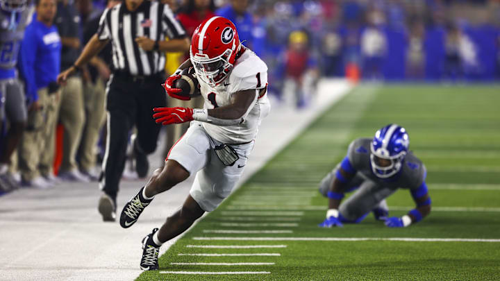 Sep 14, 2024; Lexington, Kentucky, USA; Georgia Bulldogs running back Trevor Etienne (1) runs out of bounds during the second half against Kentucky at Kroger Field. Georgia won 13-12. Mandatory Credit: Carter Skaggs-Imagn Images Sep 14, 2024; Lexington, Kentucky, USA; Georgia Bulldogs running back Trevor Etienne (1) runs out of bounds during the second half against Kentucky at Kroger Field. Georgia won 13-12. Mandatory Credit: Carter Skaggs-Imagn Images